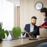 medium-shot-colleagues-discussing-work